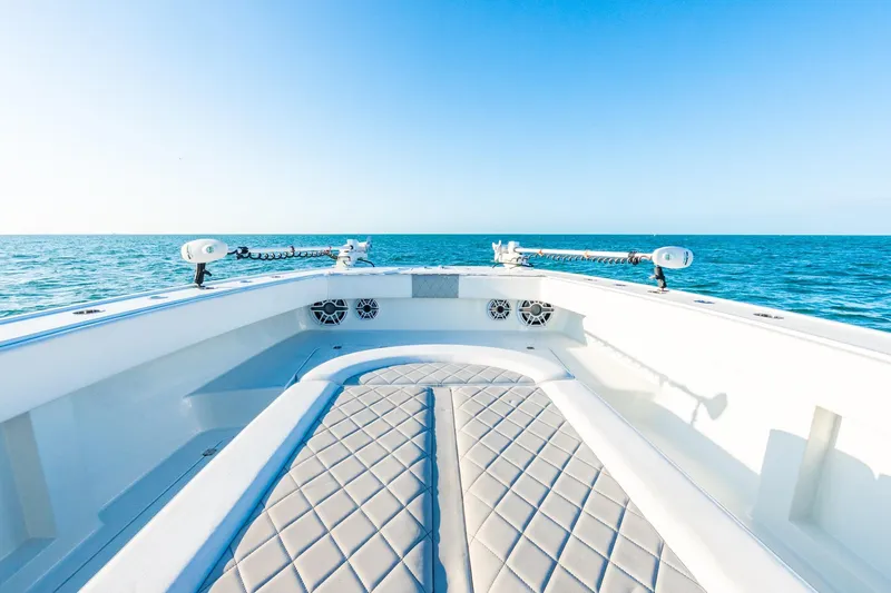 Slide: The Image of 2022 Freeman 42LR boat interior with ocean view, featuring sleek design and comfortable seating. - 57