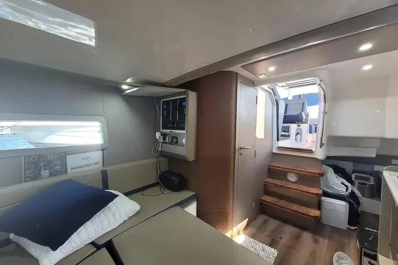 Slide: The Image of Interior of 2024 Hanover 387 yacht with modern design and comfortable seating. - 20