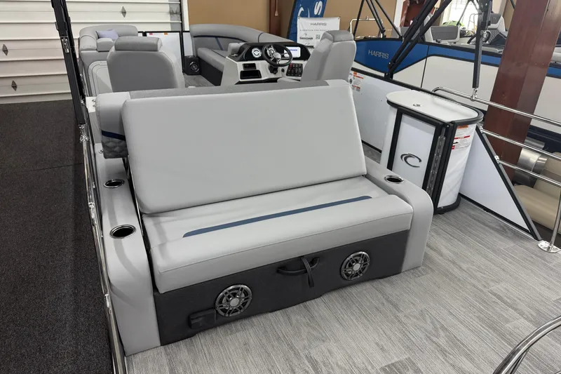 Slide: The Image of Interior of 2026 Crest Conquest 250 SLSC boat with modern seating and control panel. - 12
