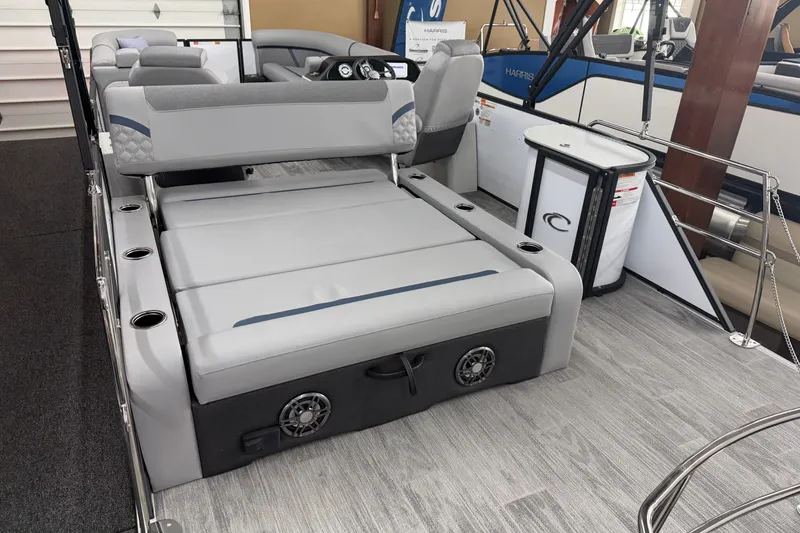 Slide: The Image of 2026 Crest Conquest 250 SLSC boat interior with gray seating and modern design. - 13