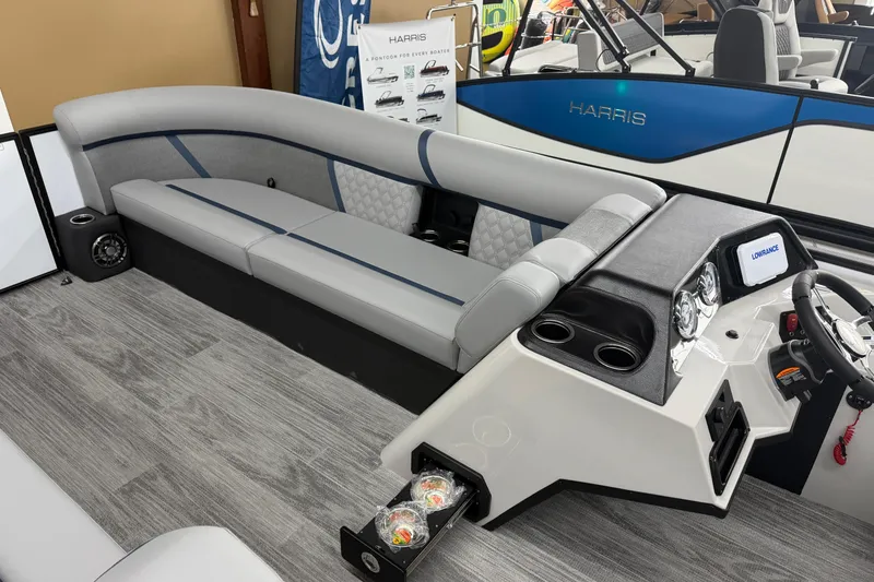 Slide: The Image of 2026 Crest Conquest 250 SLSC boat interior with sleek seating and modern dashboard. - 5