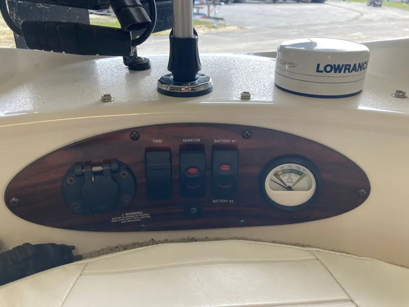 Slide: The Image of Dashboard of a 2007 Glastron GT 205 with Lowrance GPS. - 17