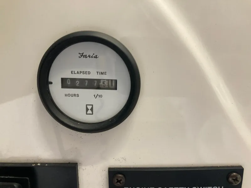 Slide: The Image of Hour meter on Glastron GT 205 boat, displaying 2775.1 hours. - 18