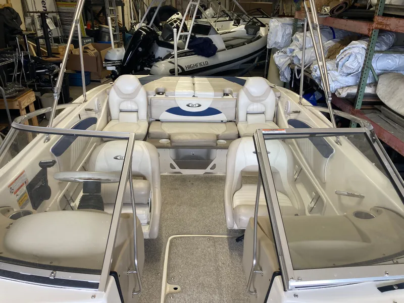 Slide: The Image of Interior view of a 2007 Glastron GT 205 boat in a storage facility. - 6