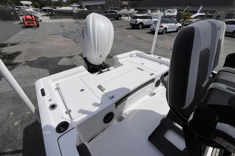 Slide: The Image of 2026 Tidewater 2300 Carolina Bay boat on parking lot. - 5