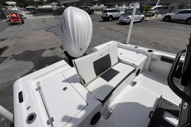 Slide: The Image of Tidewater 2300 Carolina Bay 2026 with Yamaha engine on parking lot. - 8