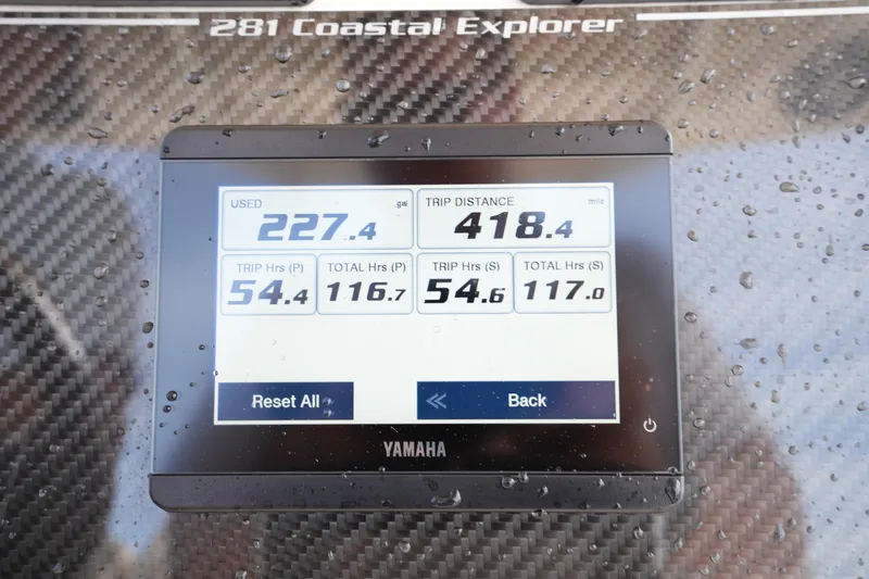 Slide: The Image of Yamaha display on 2024 Grady-White 281 Coastal Explorer showing trip data and fuel usage. - 30