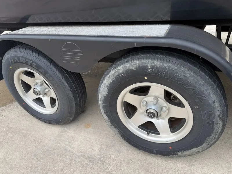 Slide: The Image of Close-up of 2010 Malibu Wakesetter 23 LSV trailer tires. - 33