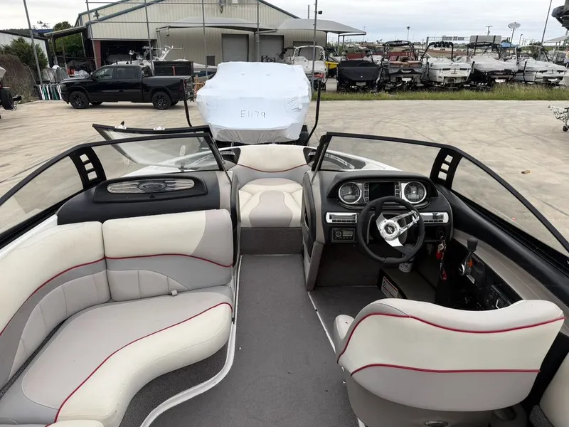 Slide: The Image of Interior of a 2010 Malibu Wakesetter 23 LSV boat on a lot. - 4