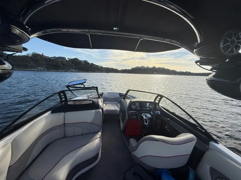 Slide: The Image of Interior of a 2010 Malibu Wakesetter 23 LSV on a lake. - 9
