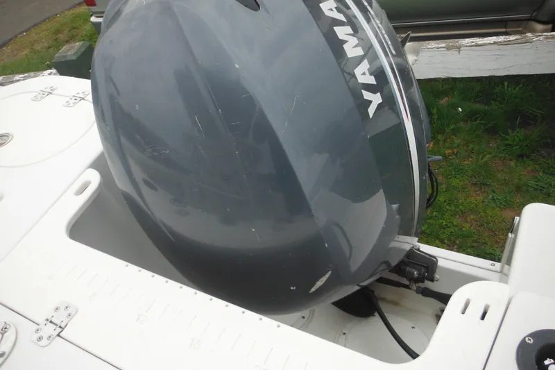 Slide: The Image of 2005 Sailfish 218 CC boat with Yamaha outboard motor, viewed from above. - 34