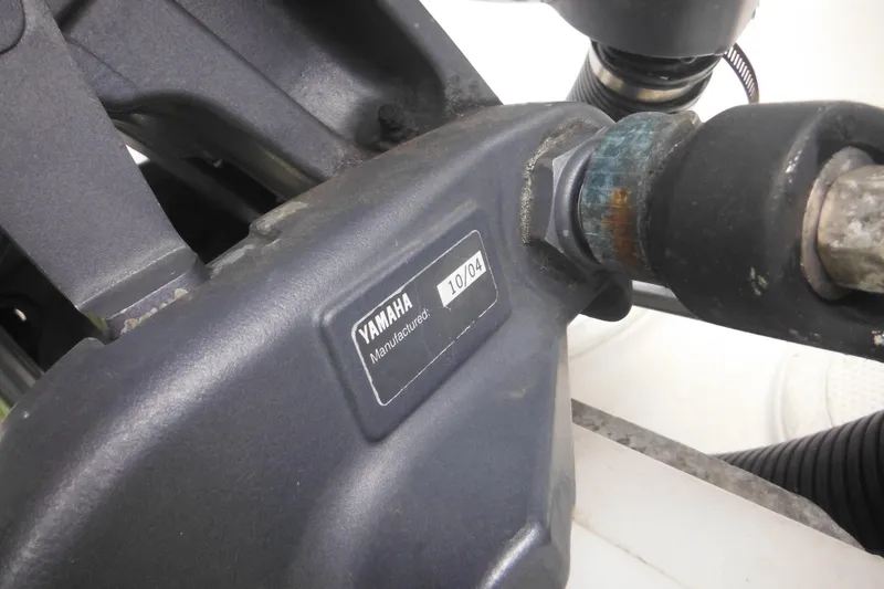 Slide: The Image of Close-up of Yamaha engine part on a 2005 Sailfish 218 CC boat. - 8