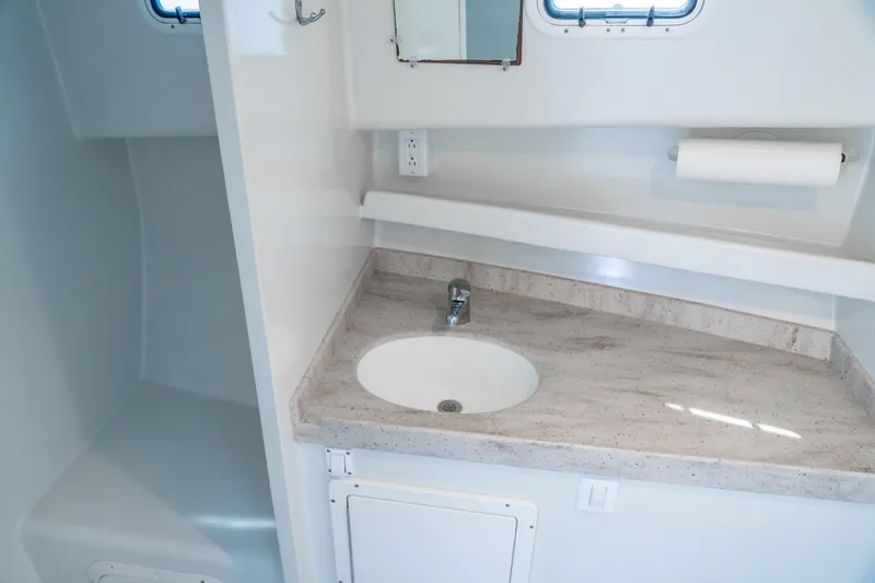 Slide: The Image of Modern bathroom interior of 2018 Northern Bay 38 boat with sink and countertop. - 38