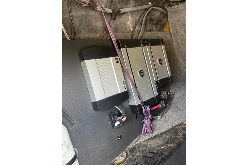 Slide: The Image of Audio amplifiers and wiring inside a 2016 Axis A22 boat. - 10