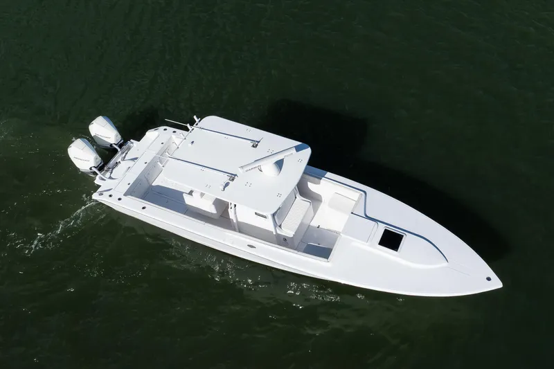 Slide: The Image of Aerial view of a 1997 Marlago 35fs boat with twin outboard motors. - 3