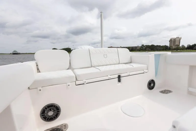Slide: The Image of Manufacturer Provided Image: 2025 Sea Fox 248 Commander boat interior with white seating and speakers. - 17