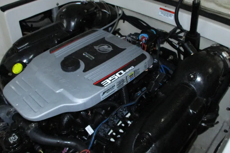 Slide: The Image of Engine of a 2011 Monterey M3 Sport Boat, featuring a 350 MAG motor. - 14