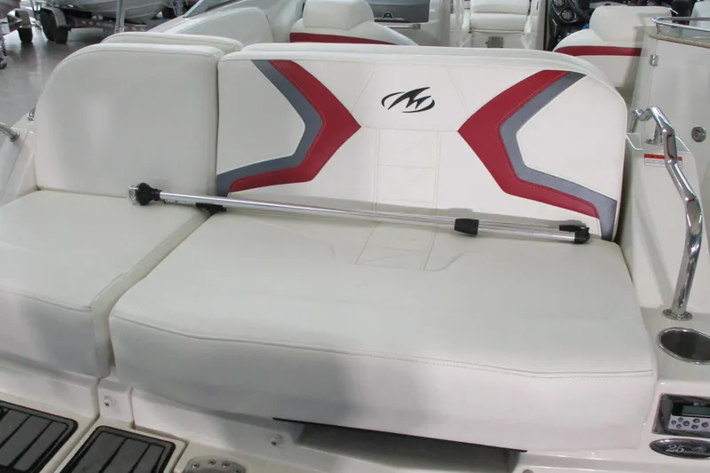 Slide: The Image of 2011 Monterey M3 Sport Boat interior with white and red seating, featuring a sleek design. - 2