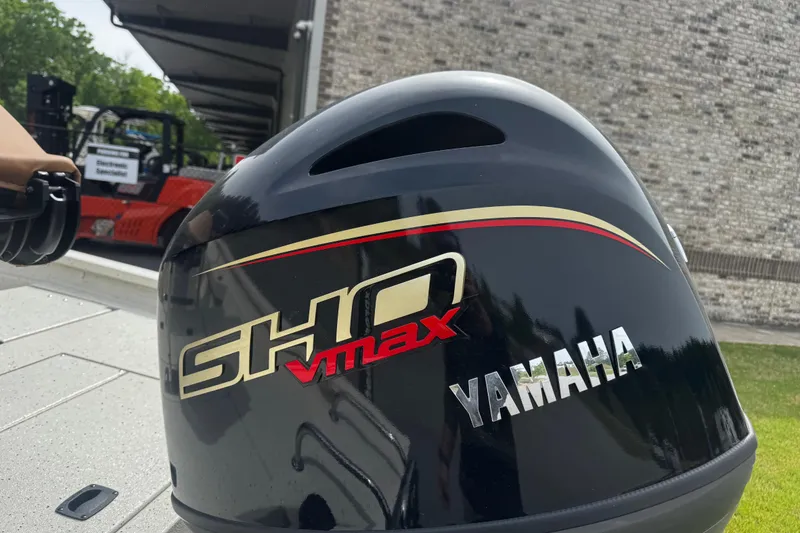 Slide: The Image of Yamaha SHO VMAX engine on 2026 Xpress H20B Bay boat, outdoor setting. - 10