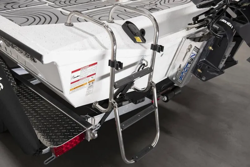 Slide: The Image of Manufacturer Provided Image: 2026 Xpress H20B Bay boat with ladder and motor detail. - 11