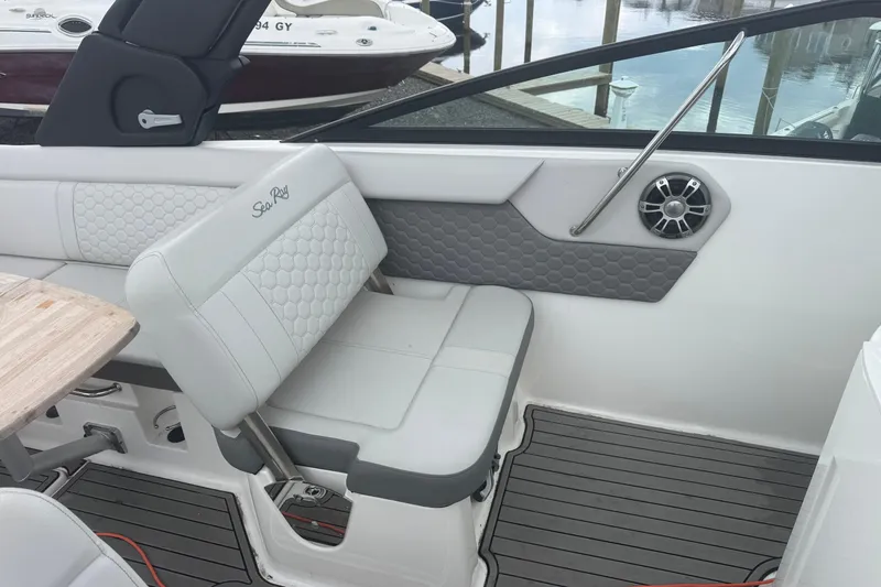 Slide: The Image of 2024 Sea Ray SDX 250 Outboard interior with stylish seating and modern design. - 13