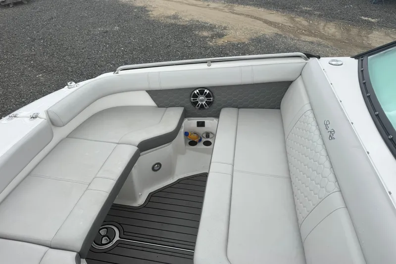 Slide: The Image of 2024 Sea Ray SDX 250 Outboard boat interior with luxurious seating and modern design. - 18