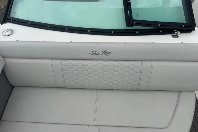 Slide: The Image of 2024 Sea Ray SDX 250 Outboard boat interior with hexagonal pattern upholstery. - 20