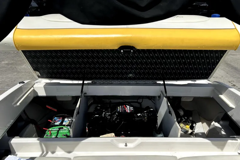 Slide: The Image of Open engine compartment of 2003 Monterey 218LS Montura Bowrider boat. - 22