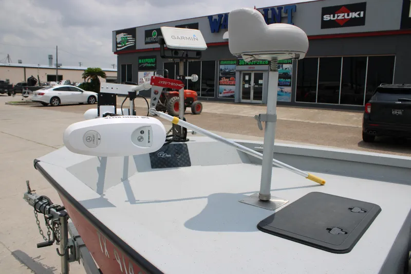 Slide: The Image of 2018 G3 Bay 18 DLX boat with Garmin equipment, displayed outside a dealership. - 10