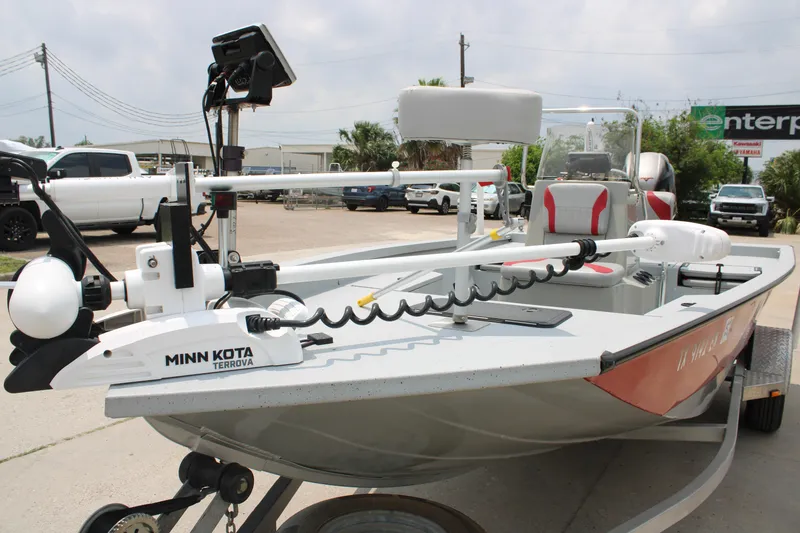 Slide: The Image of 2018 G3 Bay 18 DLX boat with Minn Kota Terrova trolling motor, parked outdoors. - 12