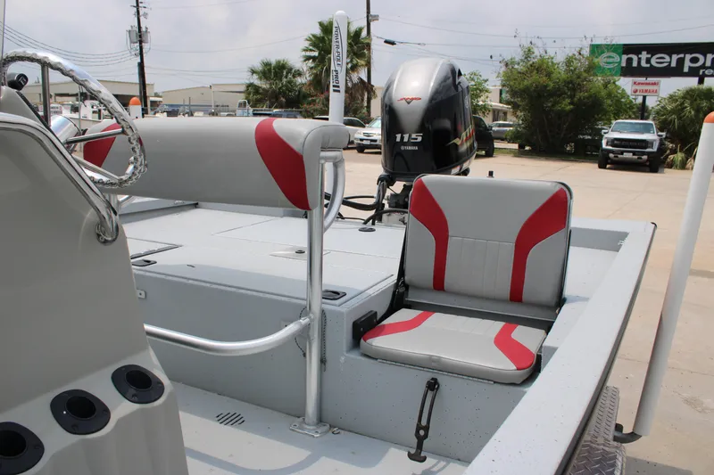 Slide: The Image of 2018 G3 Bay 18 DLX boat with Yamaha 115 engine, featuring red and gray seating. - 14
