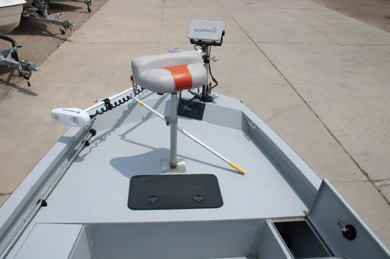 Slide: The Image of 2018 G3 Bay 18 DLX boat deck with Garmin equipment and seating. - 17