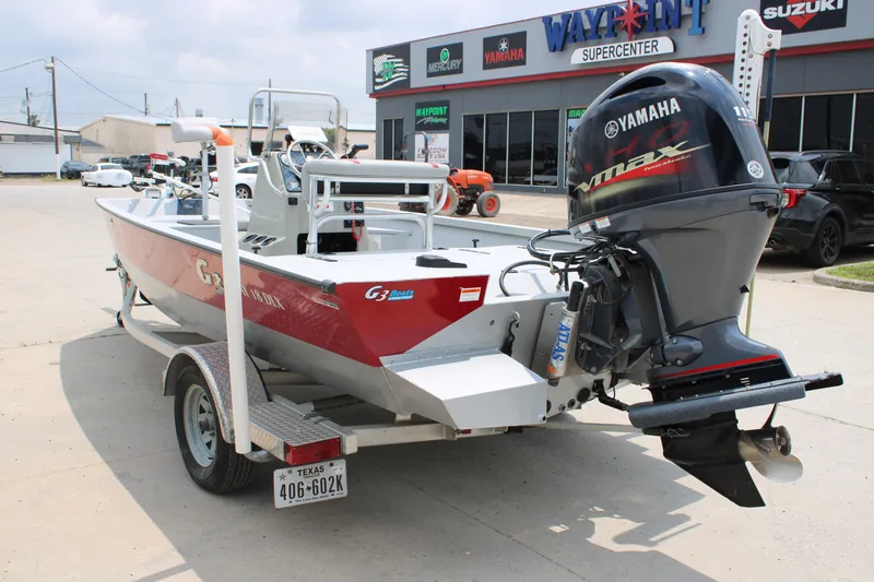 Slide: The Image of 2018 G3 Bay 18 DLX boat with Yamaha outboard motor at dealership. - 3