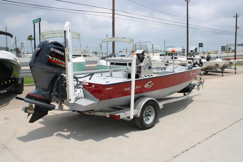 Slide: The Image of 2018 G3 Bay 18 DLX boat on trailer with Yamaha outboard motor. - 5
