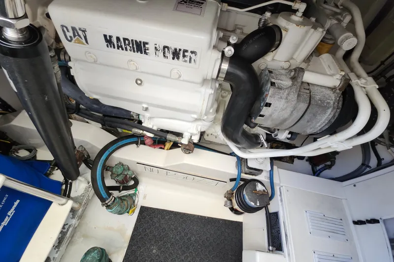 Slide: The Image of Engine room of a 2009 Cabo 36 Express with CAT Marine Power engine. - 17