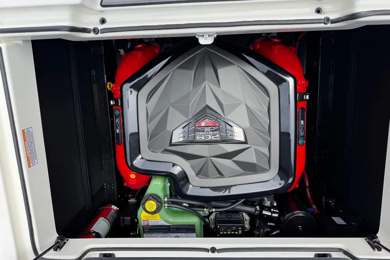 Slide: The Image of 2026 Nautique Super Air Nautique GS24 engine compartment showcasing powerful PCM engine. - 14