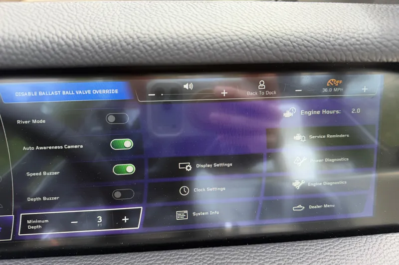Slide: The Image of 2026 Nautique Super Air Nautique GS24 dashboard displaying settings and diagnostics options. - 18