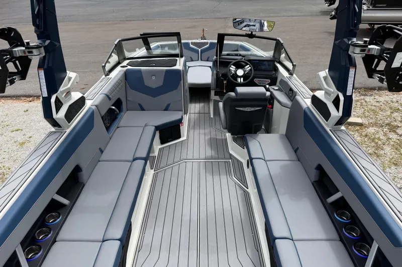 Slide: The Image of 2026 Nautique Super Air Nautique GS24 interior with sleek seating and modern dashboard. - 6