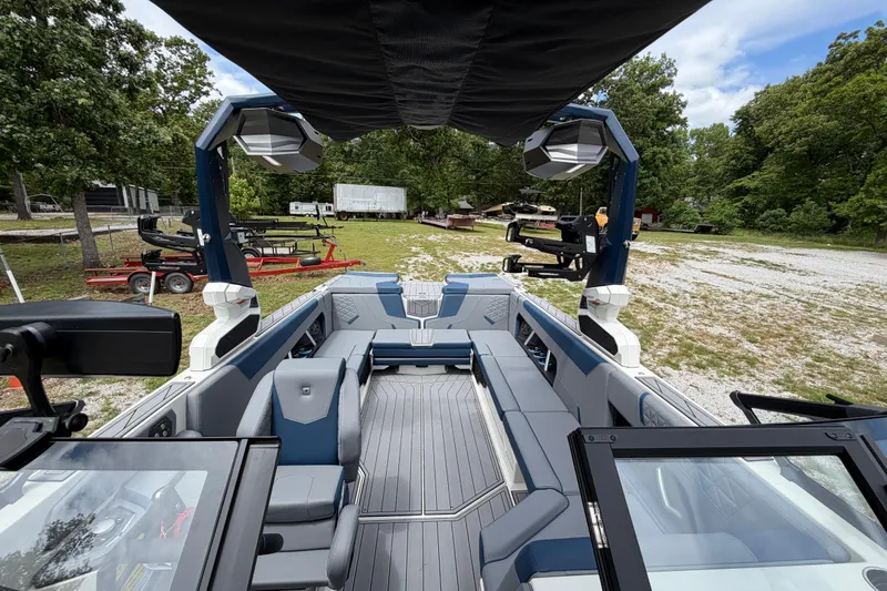 Slide: The Image of 2026 Nautique Super Air Nautique GS24 boat interior with sleek seating and modern design. - 8