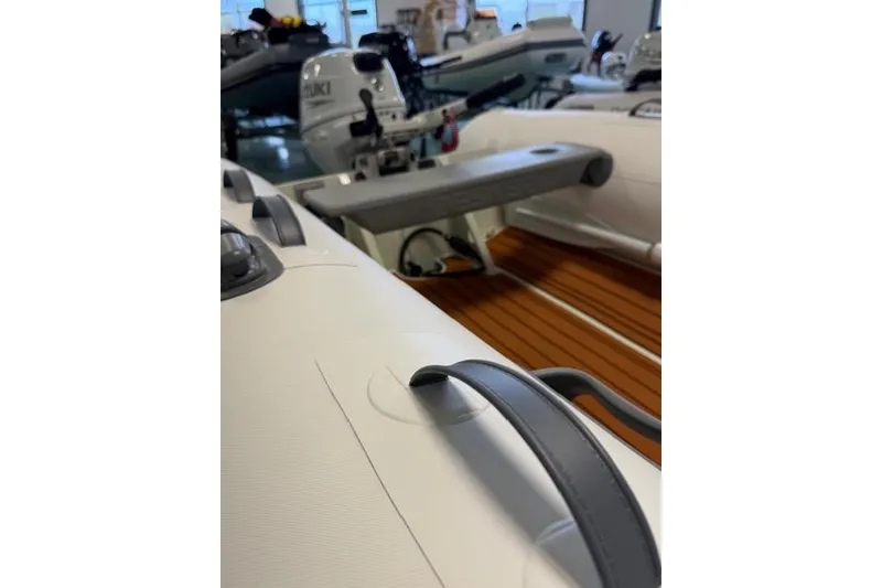 Slide: The Image of Inflatable boat interior with motor, Desner Classic CL 340, 2026 model. - 4