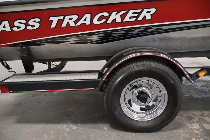 Slide: The Image of 2003 Tracker Pro Team 175 boat trailer with red and black design. - 46