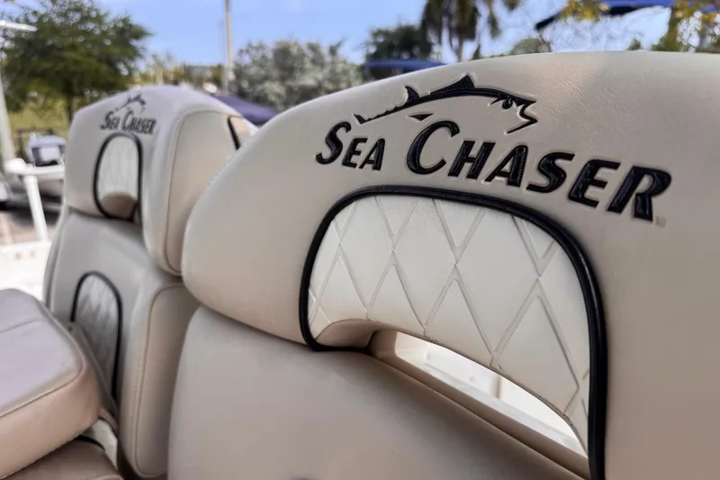Slide: The Image of Close-up of 2022 Sea Chaser 27 HFC CC boat seats with logo embroidery. - 26