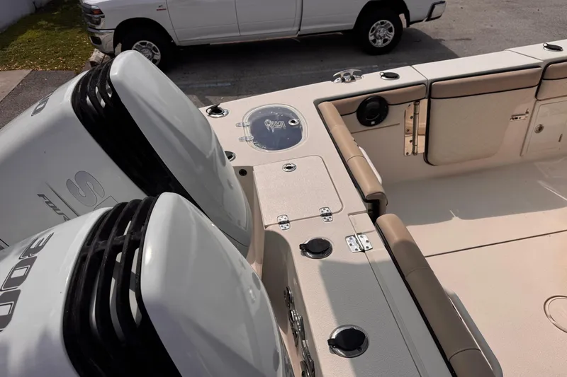Slide: The Image of 2022 Sea Chaser 27 HFC CC boat with dual engines and spacious deck layout. - 8