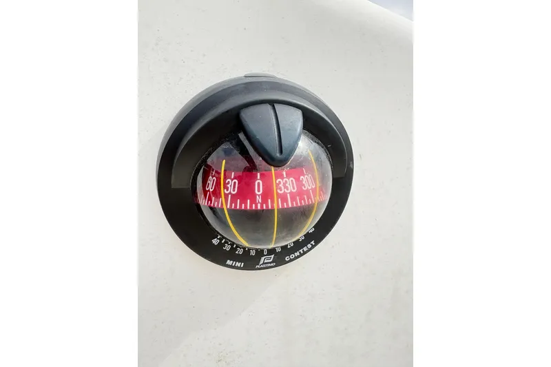 Slide: The Image of Compass on 1986 Cape Dory 26 sailboat, displaying directional degrees. - 11