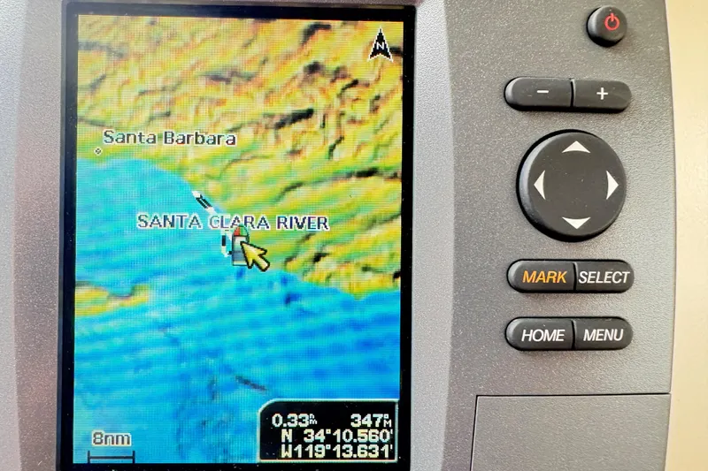 Slide: The Image of GPS navigation screen showing Santa Clara River near Santa Barbara, coordinates displayed. Cape Dory 26, 1986. - 4