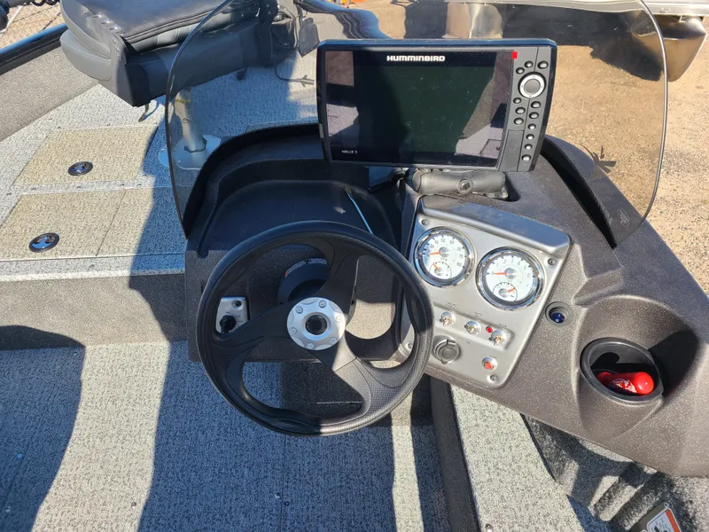 Slide: The Image of 2023 Tracker Pro Guide V16 SC boat dashboard with Humminbird display. - 13