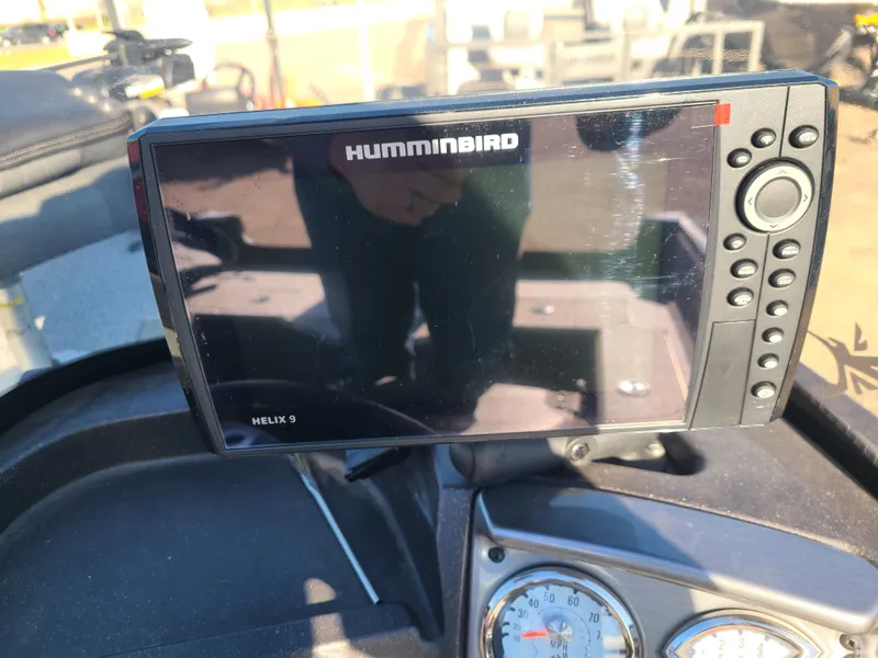 Slide: The Image of Humminbird Helix 9 on Tracker Pro Guide V16 SC boat. - 15