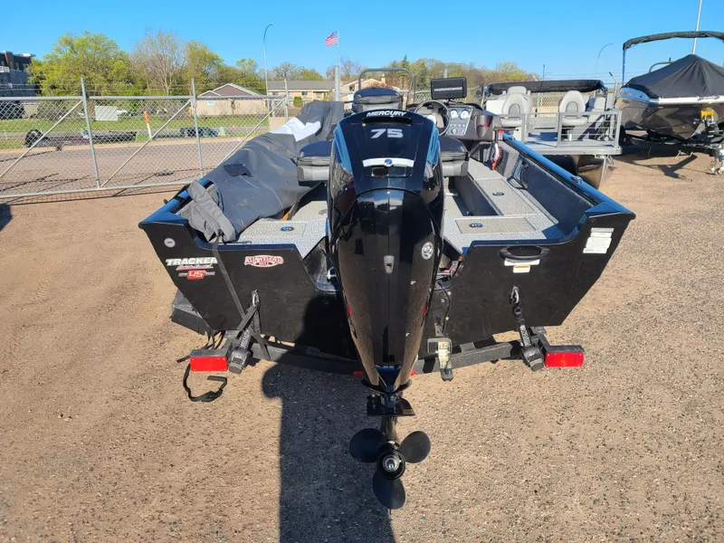 Slide: The Image of 2023 Tracker Pro Guide V16 SC with 75HP Mercury engine. - 3