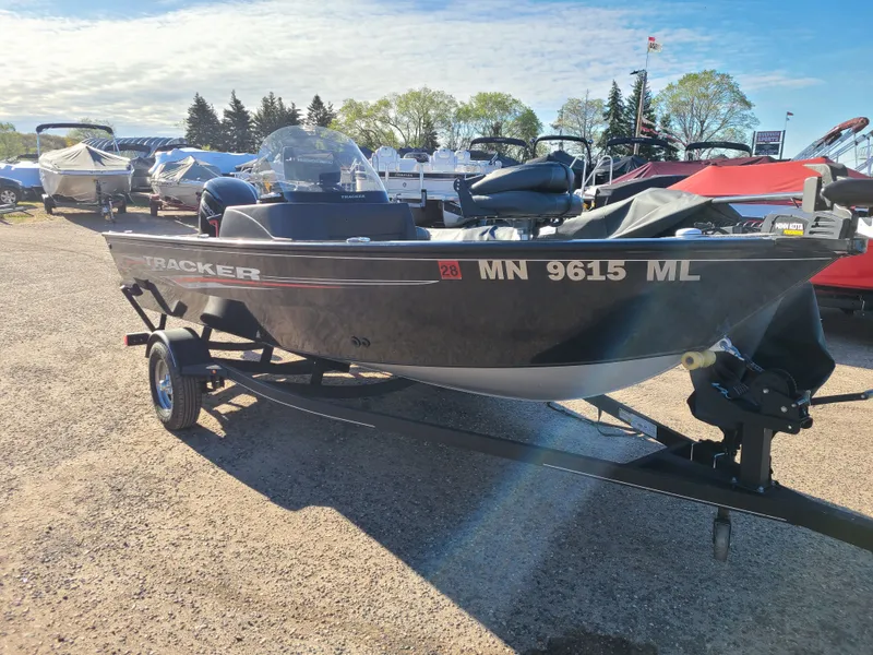 Slide: The Image of 2023 Tracker Pro Guide V16 SC boat with 75HP Mercury engine. - 4