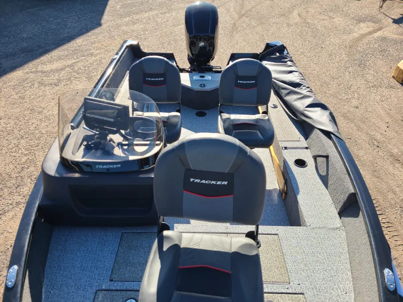 Slide: The Image of 2023 Tracker Pro Guide V16 SC boat with 75HP Mercury engine. - 5